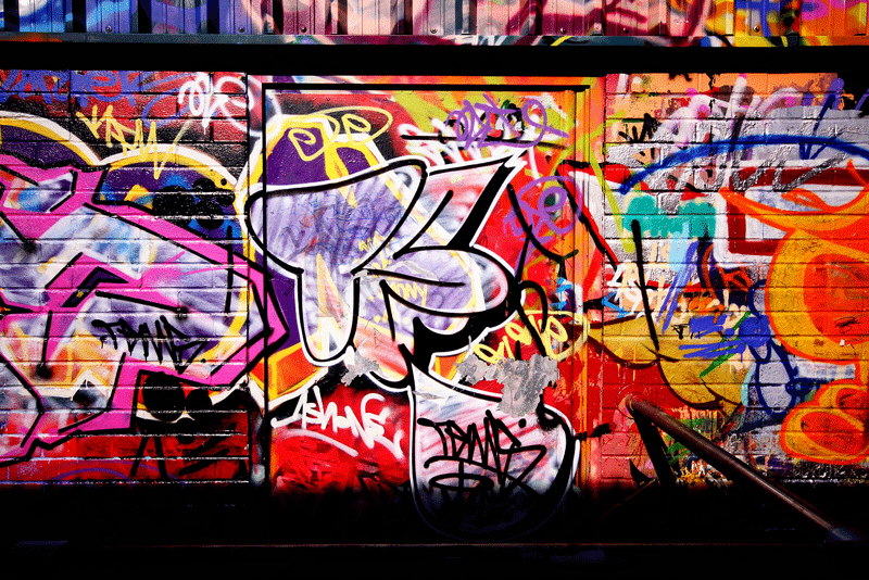 An image of graffiti art on a wall in an alleyway. This could represent an expressive art form learned from a self fulfillment therapist in Ontario, CA. Learn more about online therapy in Ontario and other services today.